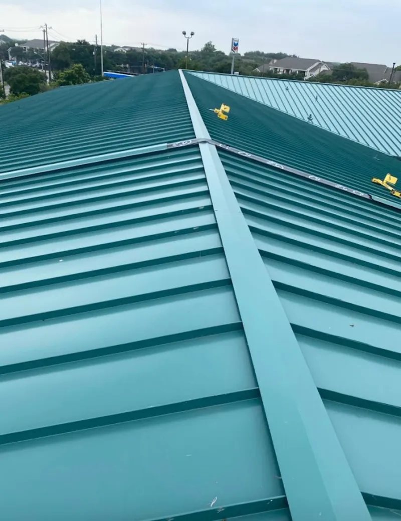 Green commercial metal roof ridge and valley for Metal Roof Repair in Vancleave